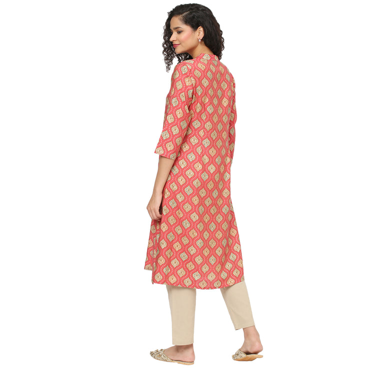 Radiant in Coral: A Kurta that Shines